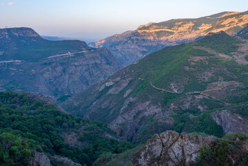 Fototapeta na wymiar Sunset view of Vorotan river valley on the way to Tatev village in Armenia