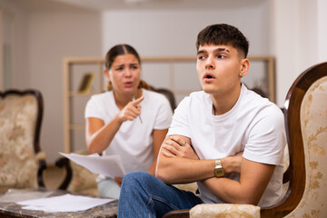 Obraz premium Man is sad because of the conflict with his wife at home