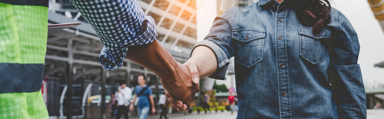 Banner Business Partner shake hands Fist bump together. Trust Teamwork Partnership Industry contractor fist bump deal job. Banner Mission team meeting team BusinessPeople teamwork with copy space