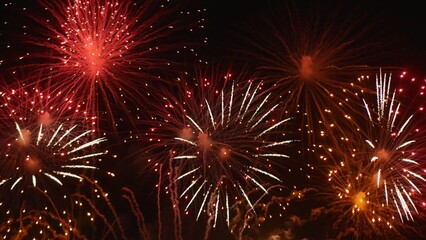 Naklejka premium Red Firework celebrate anniversary happy new year 2024, 4th of july holiday festival. red firework in night time celebrate national holiday. Countdown to new year 2025 festival party time event