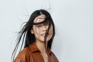 Woman salon model beautiful cosmetic glamour fashion portrait beige femininity asian beauty hair