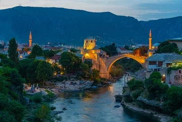 Photo sur Plexiglas Tower Bridge Sunset view of the old Mostar bridge in Bosnia and Herzegovina