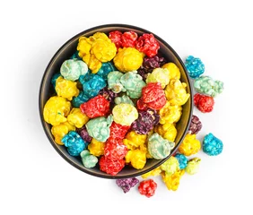Gordijnen Bowl with sweet colorful popcorn on white background © Pixel-Shot