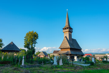 Fototapeta na wymiar Cuvioasa Paraschiva wooden church church in Sat-Sugatag, Romania