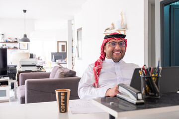 working from increase your productivity and reduces distractions which leads to focus and great outcomes, young arab working  home