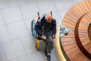 old man on wheel chair alone