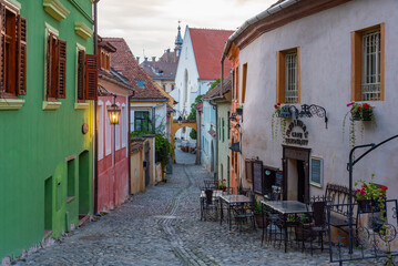 Colourful street in the old town of Sighisoara, Romania