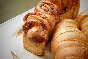 sweet whole wheat bread with cinnamon powder and walnuts,salt on butter roll bun