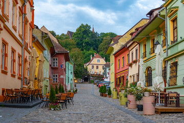 Colourful street in the old town of Sighisoara, Romania