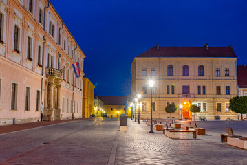 Fototapeta na wymiar Sunset view of the Holy Trinity square in the old town of Osijek, Croatia