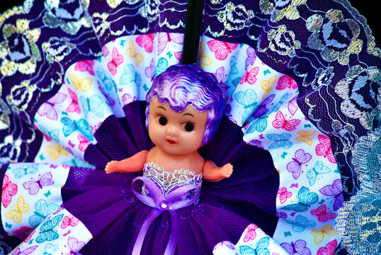 Kewpie doll at a fair