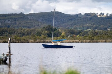 yacht anchored in a bay in the australian wilderness
