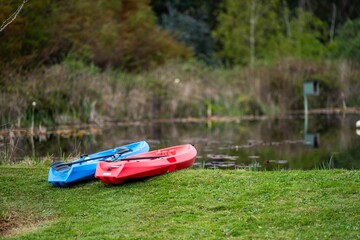 canoe and kayak next to a lake in Australia in summer. kayaking