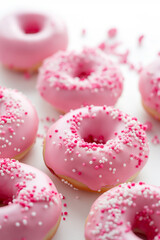 Commercial photography, White background, pink frosted doughnuts, sophistication, Apple Inc design style --ar 2:3 --style raw --stylize 50 --v 6 Job ID: 50b693eb-4375-4963-93fb-d45b2acd28a0