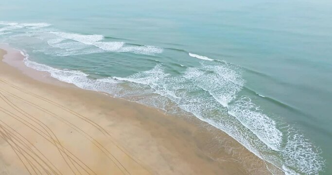 Beautiful Shimei Bay beach scenery of Wanning Hainan China, Waves crashing on the white sandy clean beach 