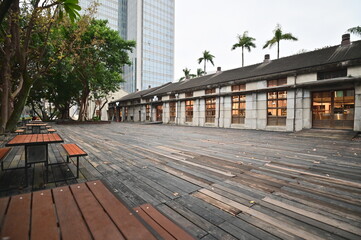 TW - 01.24.24: Songshan Cultural and Creative Park, once Songshan Tobacco Factory, now offers cultural, historical, and tourist attractions. The photo depicts an outdoor rest area in the park.