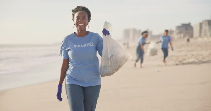 Face, beach or happy black woman with plastic bag for earth day, sustainability or ocean cleaning project. Recycle, sustainability and portrait of volunteer at sea for NGO, accountability or charity