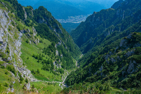 Summer day at Caraiman valley leading to Bucegi mountains near Busteni village in Romania