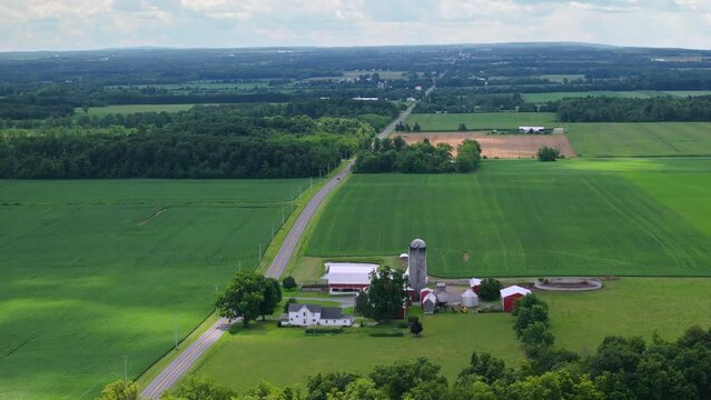 Farm barn and silos in rural Ohio, USA. American agricultural landscape