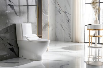 A white toilet with a black lid sits in a bathroom with a marble wall.