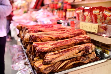 TW-01.18.24: Cured pork: A Lunar New Year delicacy. Cured pork is a Lunar New Year staple in Chinese regions. Made with pork, it's salty, savory, and firm. Enjoy it stir-fried, steamed, or stewed.