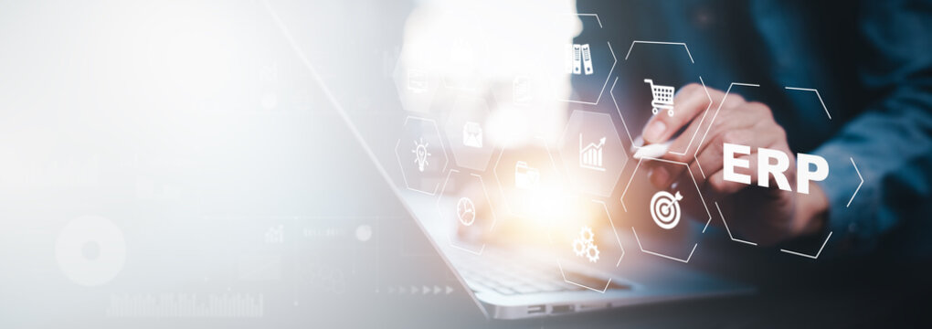 Business people using a laptop with document management for ERP. Enterprise resource planning concept,Enterprise Resource Management ERP software system for business resources plan presented.