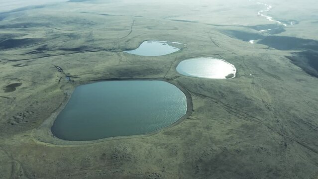 Three Lakes In Town Of Dmanisi In Kvemo Kartli, Georgia. aerial pullback shot