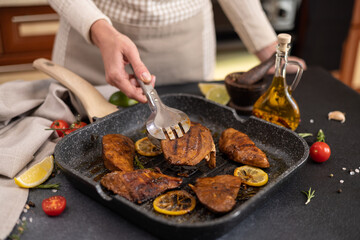 grilled pieces of Organic Tuna Steak on a grill frying pan