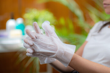 Nourishing hands with moisturizing gloves, perfect for hydrating and softening dry skin at home - 779390350