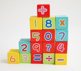 Number wood block cubes for learning Mathematic, education math concept.