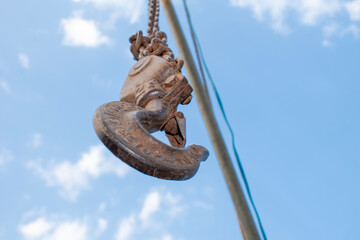 Old rusty metal chain hanging, Rusty chain links outdoors in close up, detail of a chain and hook...