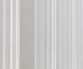 White curtain texture for background with copy space for text or image. Walls of the building
