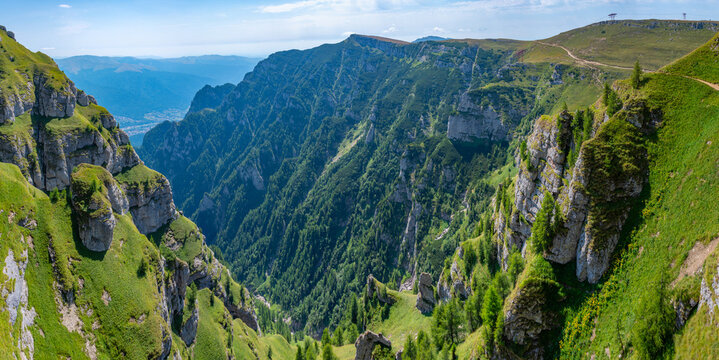 Summer day at Caraiman valley leading to Bucegi mountains near Busteni village in Romania