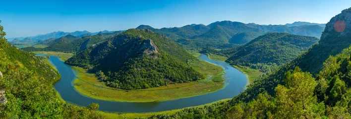 Selbstklebende Fototapeten Meander of Rijeka Crnojevica river leading to Skadar lake in montenegro © dudlajzov