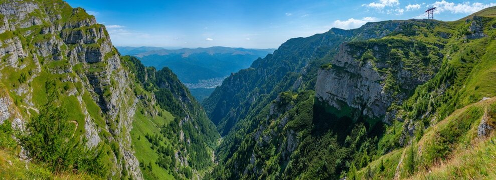 Summer day at Caraiman valley leading to Bucegi mountains near Busteni village in Romania