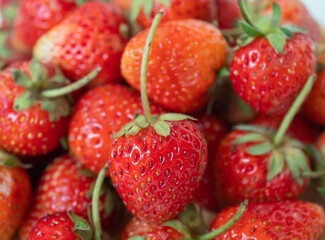 Red ripe strawberries background. Close up, top view.
