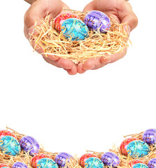 Easter eggs in a hand isolated