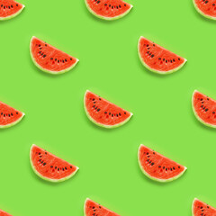 Colorful  fruit seamless pattern of fresh watermelon slices on bright green background. Flat lay summer background.