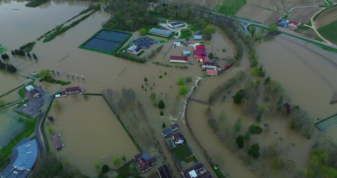 Aerial view of the floods in the France. Yonne river in flood. Natural disaster. Water flooded a city in french department. Chablis town flooded. Spring flood in France