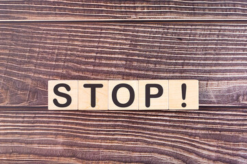STOP word made with wood building blocks