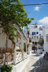 Picturesque cobblestone pedestrian streets leading up to traditional Greek homes in the Old Town of Mykonos, Greece