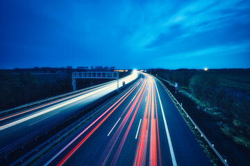 Langzeitbelichtung - Autobahn - Strasse - Traffic - Travel - Background - Line - Ecology - Highway - Long Exposure - Motorway - Night Traffic - Light Trails - High quality photo - obrazy, fototapety, plakaty