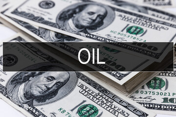Text OIL is written on the background of American banknotes. Business concept.