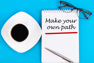 Make your own path text concept written in a notebook with pen, top view.