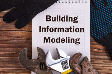 BIM - Building information modeling concept on a notebook - obrazy, fototapety, plakaty