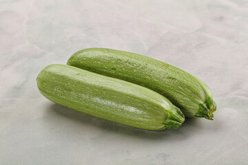 Raw green ripe zucchini vegetable