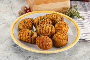 Baked baby potato with thyme