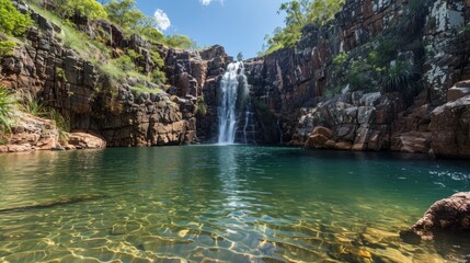 A majestic waterfall cascading over rugged cliffs into a crystal-clear pool  AI generated illustration