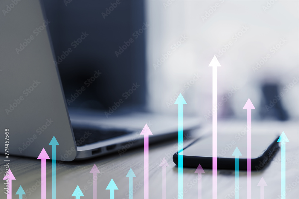 Poster close up of laptop and smartphone on desk with various growing arrows on blurry background. mock up 