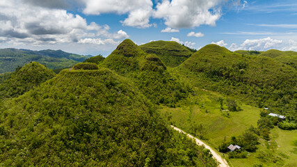 Aerial drone of limestone peaks in the highland. Hinakpan Chocolate Hills. Negros, Philippines